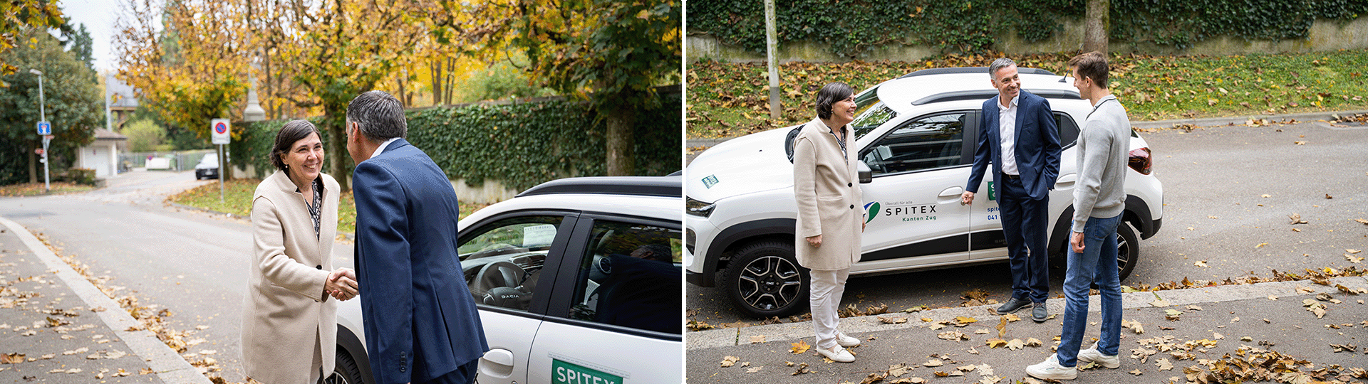 Personen schütteln sich die Hände vor Spitexauto in herbstlicher Stimmung. 